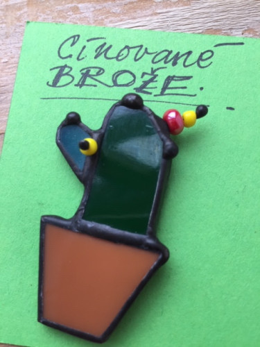 Cínované brože